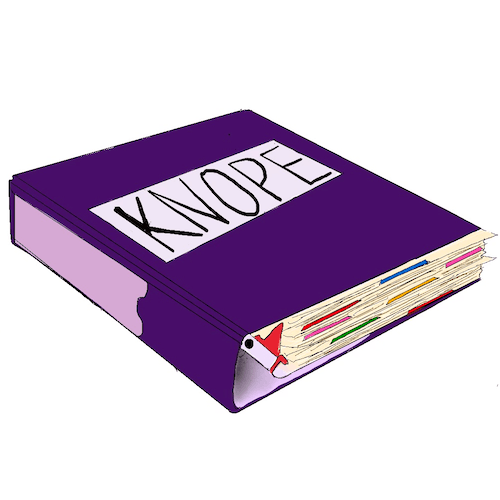 A purple binder, stuffed to the brim with papers. The word "Knope" is written on the front